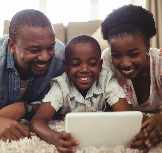 Download and Stream feature card showing a mother, father, and son looking at tablet together and smiling