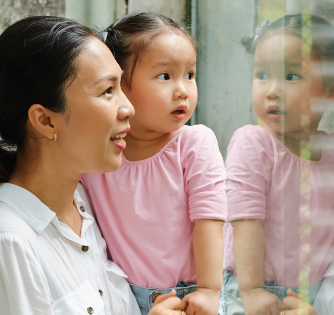 Museum Passes feature card showing a mom and her daughter in a museum