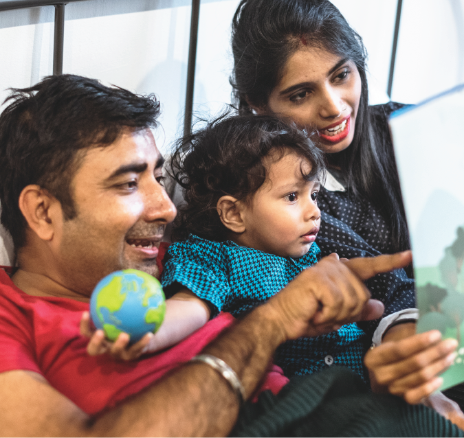 Reading Recommendations feature card showing a mom, dad, and son reading together