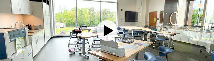 Studio 411 makerspace with play button in the middle