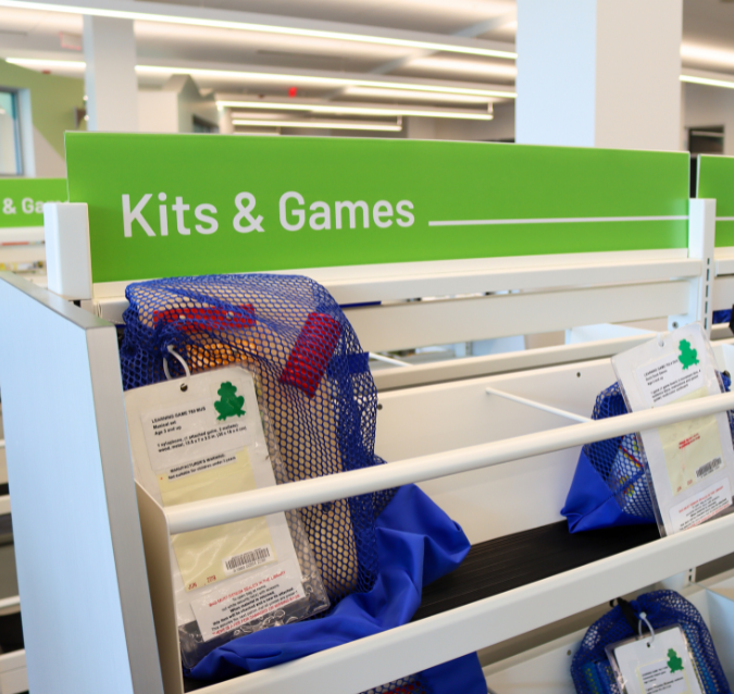 Kits and games shelf at the library