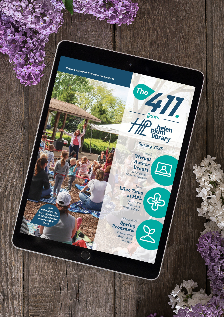 Digital Spring 411 newsletter in a tablet on a wooden table surrounded by lilacs