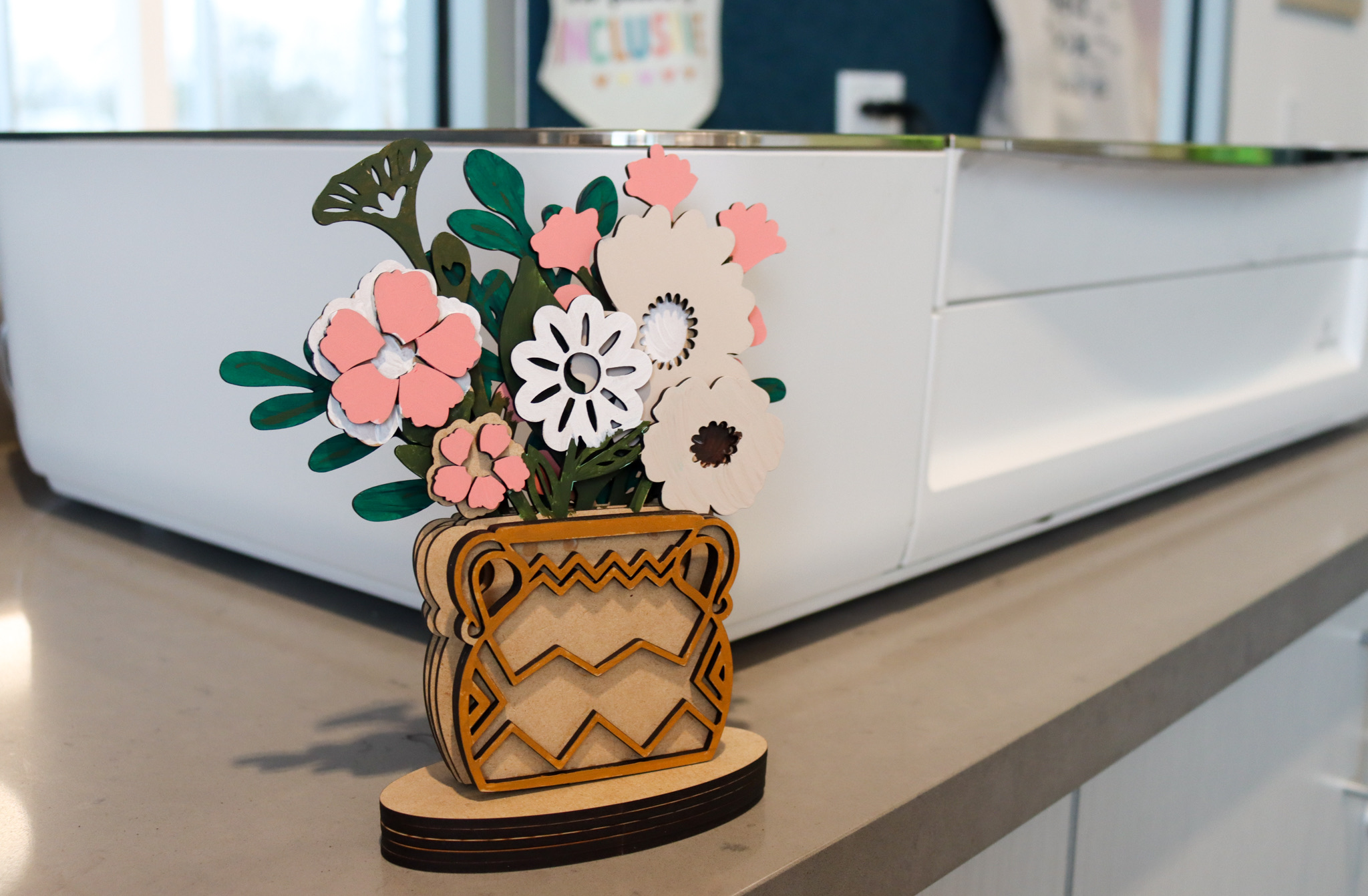 Wood vase filled with wood flowers