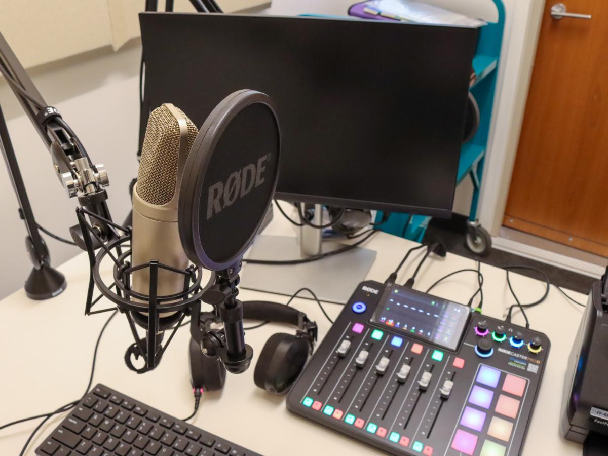 Recording equipment with microphone and mixing board in the Recording Lab
