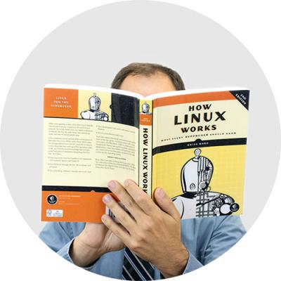 Alex Vancina with Linux book